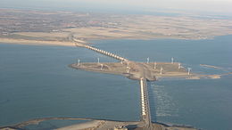 The Oosterscheldekering storm surge barrier is part of the Delta Works