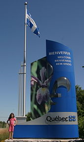 Flag and border sign of the province of Québec