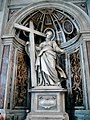 Four large statues are in the piers near the High Altar. Saint Helena holds the True Cross which she found in Jerusalem.