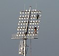 Workers working on a light in the ground