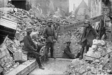 St. Quentin was largely destroyed as part of the Siegfried position, in the picture the entrance to the German commandant's office