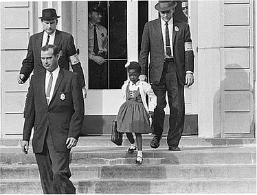 U.S. Marshals protect 6-year-old Ruby Bridges, the only black child in a Louisiana school (1960)