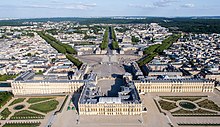 View over the castle of Versailles to the city