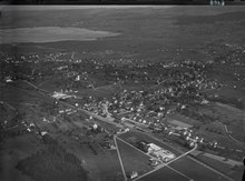 Aerial view of Wetzikon in the direction of Pfäffikersee by Walter Mittelholzer (1931)